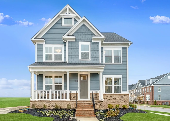 Blue exterior of one of the new single-family homes for sale in Baltimore County MD by Lennar Homes in the Greenleigh community
