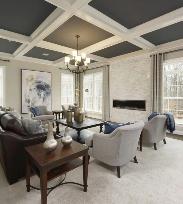Beautiful living room with a vaulted blue ceiling in a Williamsburg Home at Greenleigh